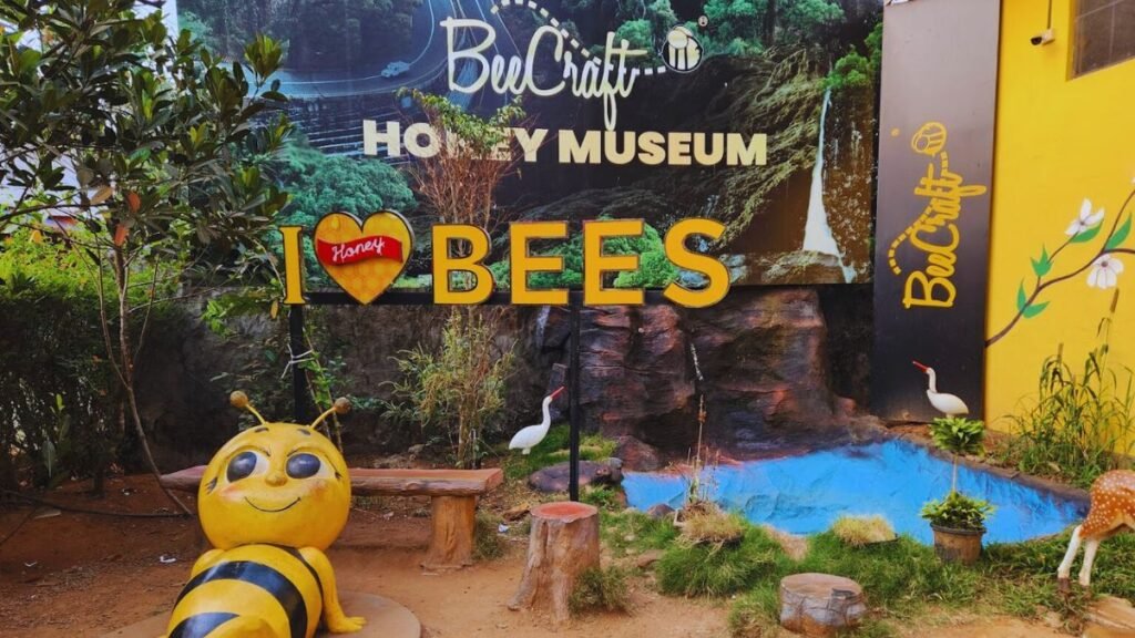 The entrance of the Honey Museum Wayanad also known as Bee craft Museum, with a logo mentioning I love bees